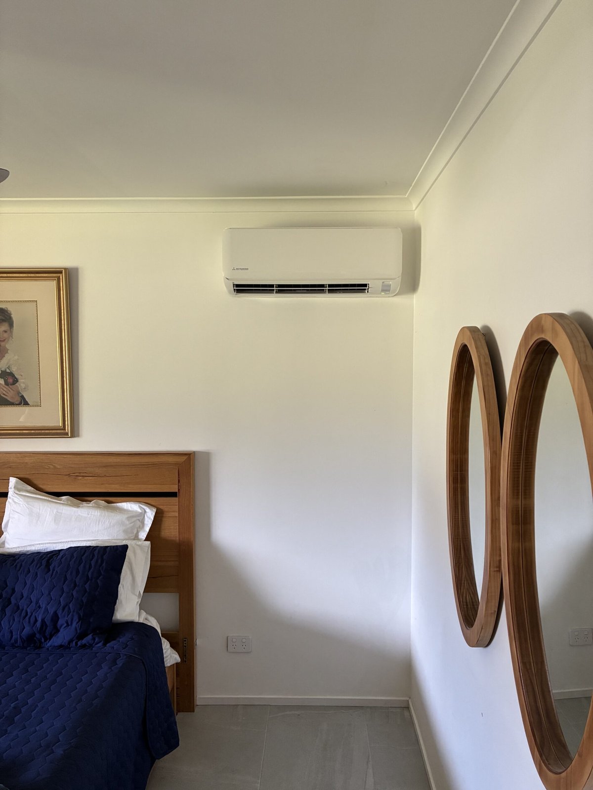 Outdoor compressor split system unit installation — Burbank split system by Amplus Electrical and Air