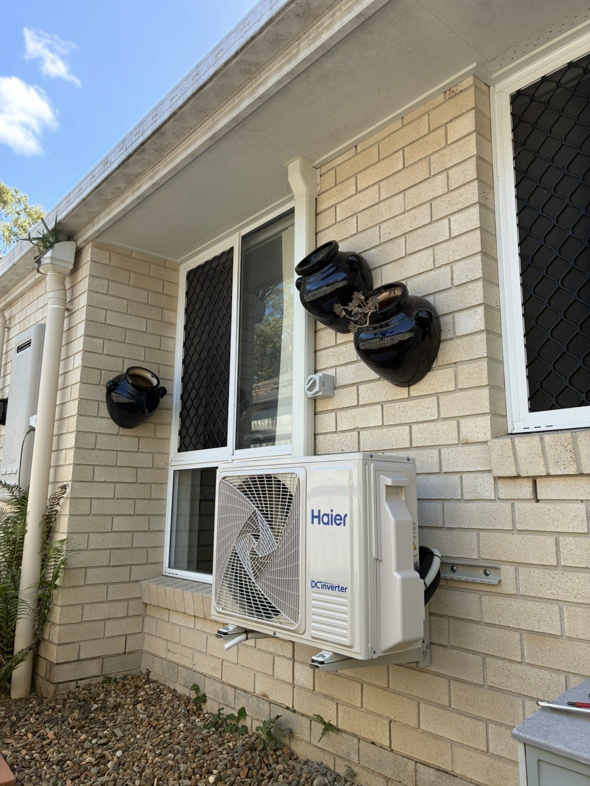 Split system wall-mounted indoor unit installed in living room — Redland Bay air conditioning by licensed electrician