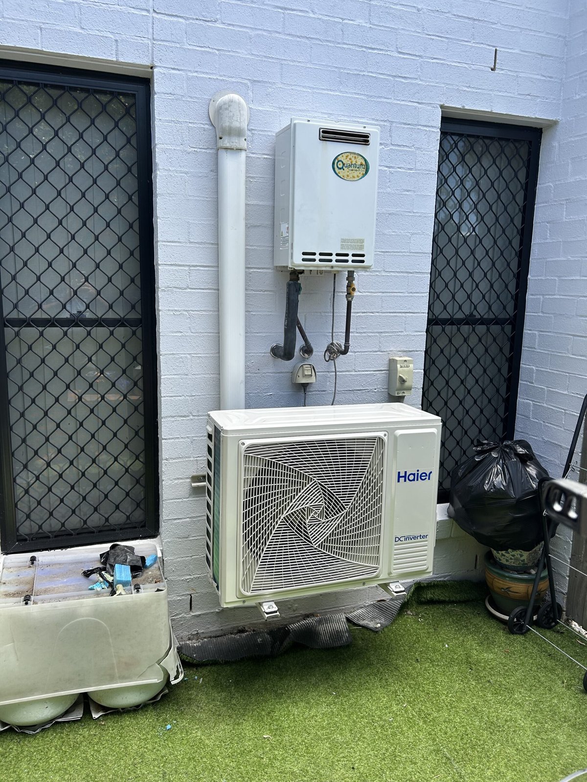 Split system installation in progress by Amplus Electrical and Air — serving Wellington Point homeowners