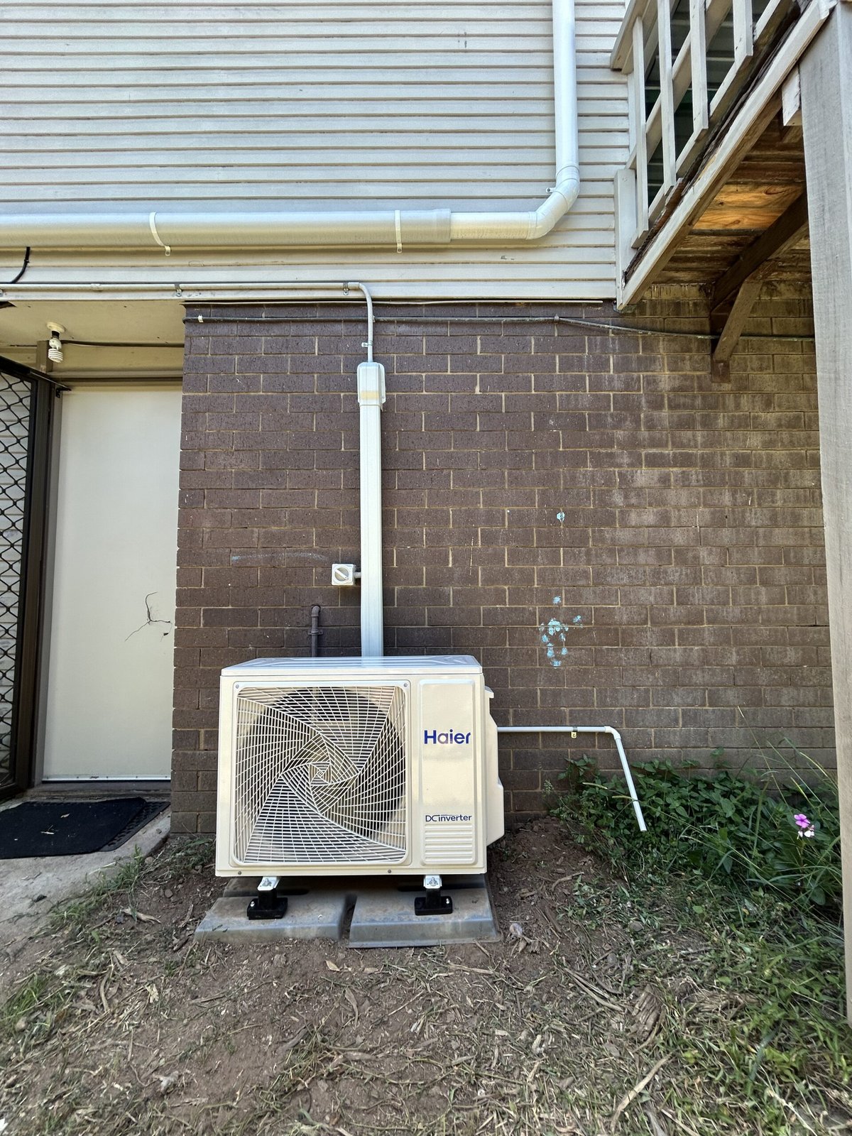 Outdoor condenser unit installation installation — Birkdale split system by Amplus Electrical and Air