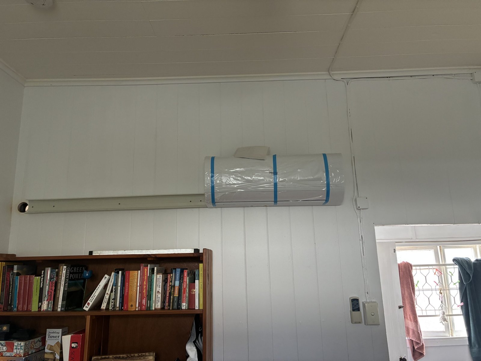 Split system installation in progress by Amplus Electrical and Air — serving Carindale homeowners