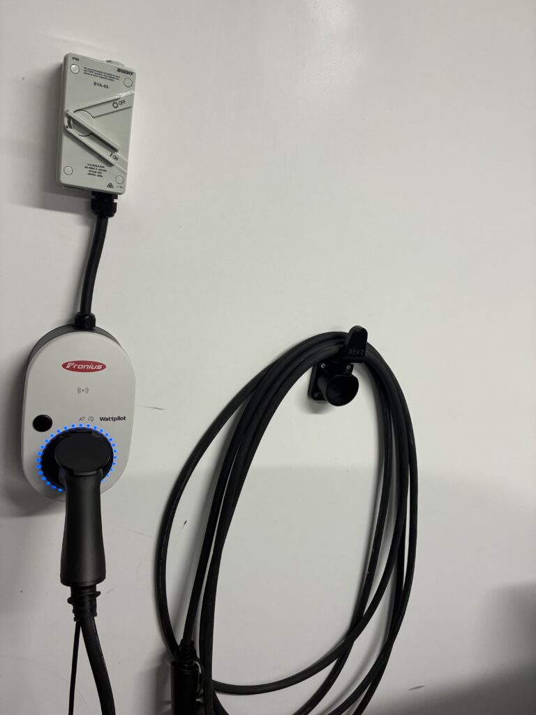 Finished home EV charger installation in Brisbane's bayside Redlands by licensed electrician Amplus Electrical