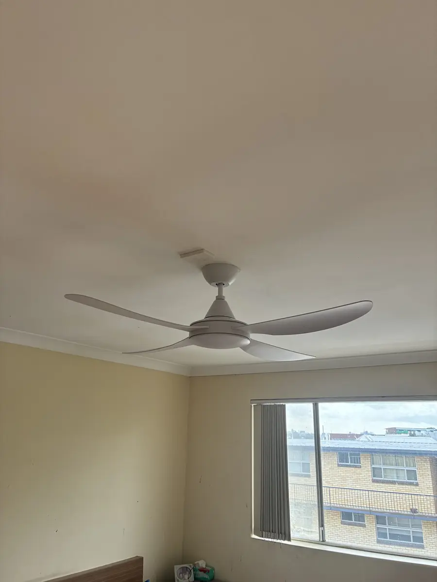 Four-blade DC ceiling fan installed in a Redlands bedroom